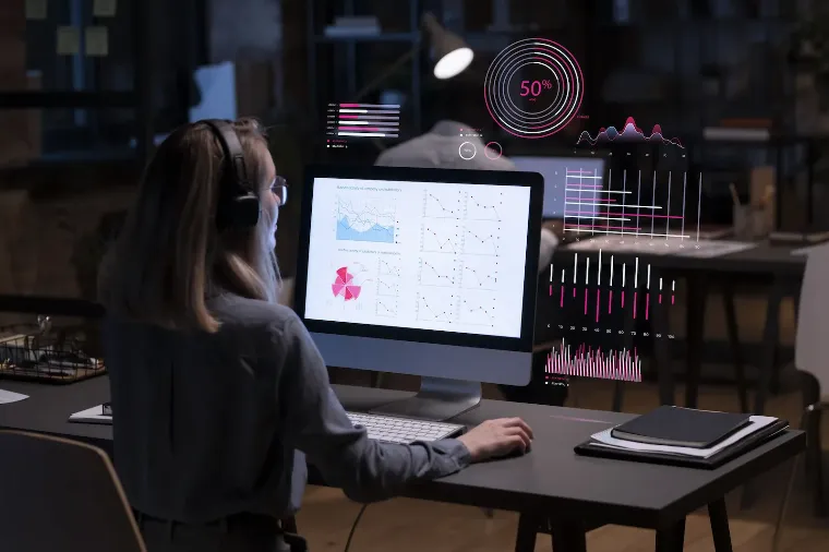Analyst reviewing governed company dashboards
